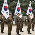 6.25 공휴일 폐지 논란 6.25 전쟁 기념식에서 참전용사들이 태극기를 바라보며 묵념하는 모습